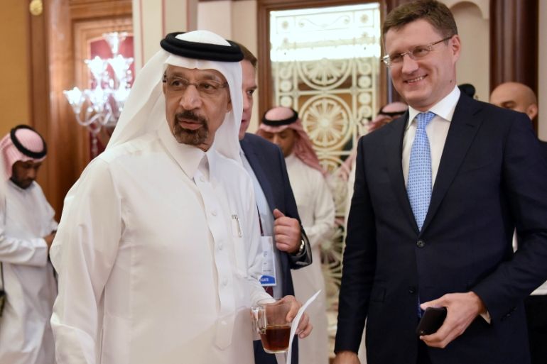 Saudi Arabian Energy Minister Khalid al-Falih, stands with Russian Energy Minister Alexander Novak after the OPEC 14th Meeting of the Joint Ministerial Monitoring Committee in Jeddah