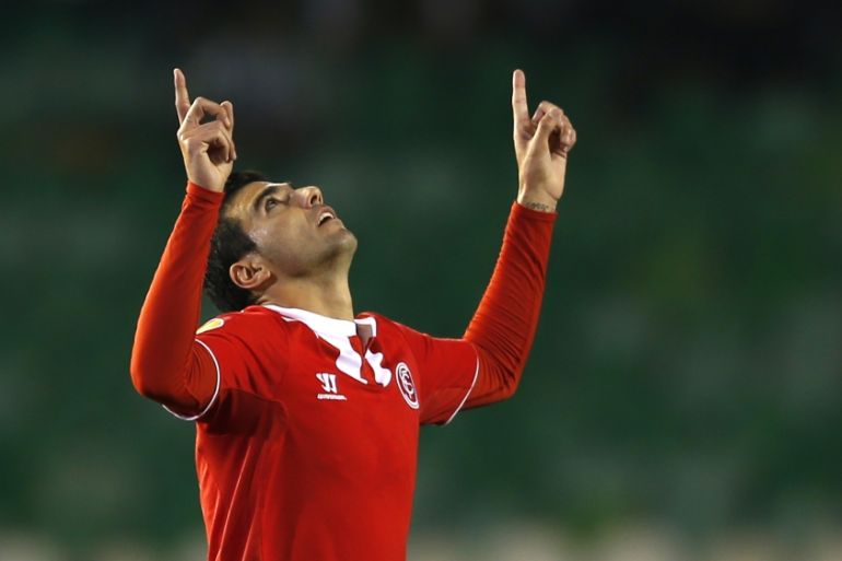 Sevilla''s Jose Antonio Reyes celebrates after scoring against Real Betis during their Europa League round of 16 second leg soccer match in Seville