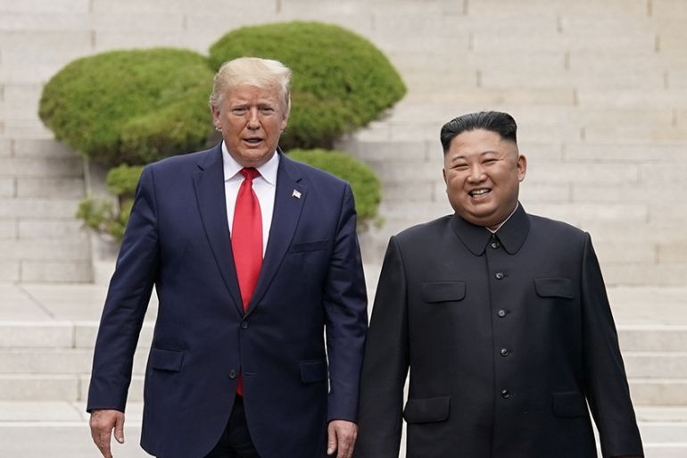 U.S. President Donald Trump meets with North Korean leader Kim Jong Un at the demilitarized zone separating the two Koreas, in Panmunjom, South Korea, June 30, 2019. REUTERS/Kevin Lamarque -