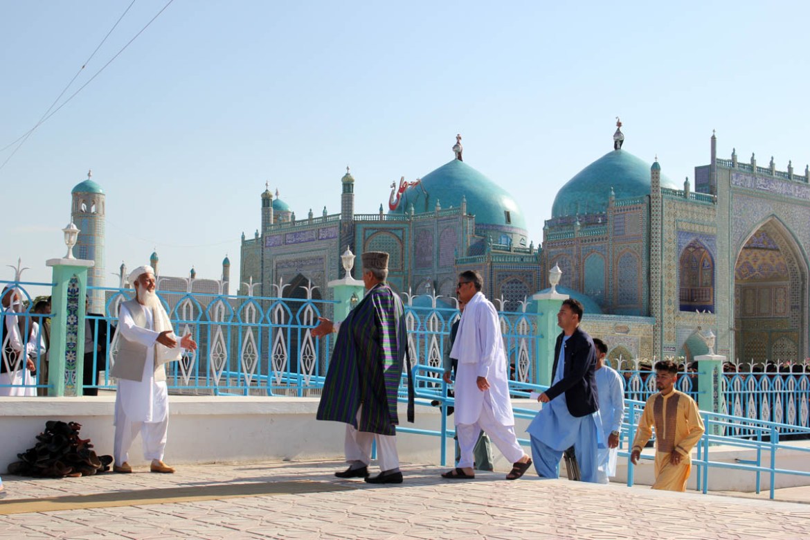 Eid al-Fitr in Afghanistan- - MAZAR-I-SHARIF, AFGHANISTAN - JUNE 4: Muslims arrive to perform Eid al-Fitr prayer at Rawza-i-Sharif (Shrine of Ali) mosque in Mazar-i-Sharif, Afghanistan on June 4, 2019