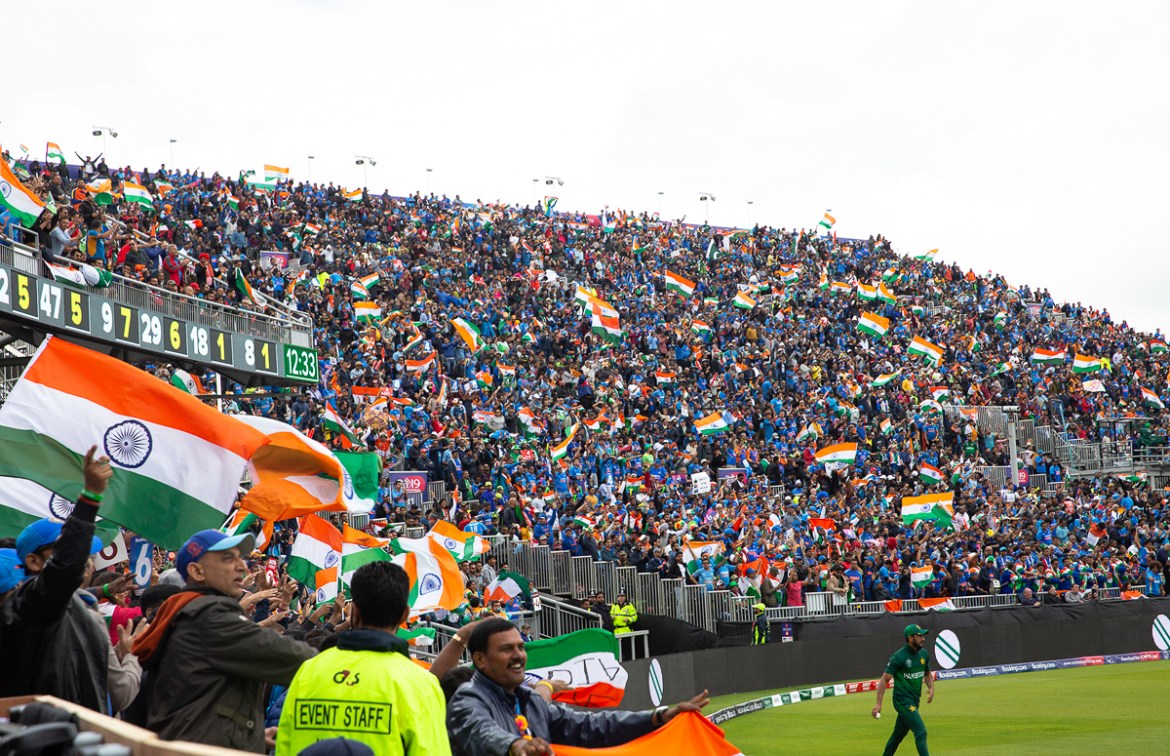 The Indian contingent easily outnumbered that of Pakistan. The flags and blowhorns were out every time an Indian batsman hit a boundary or a Pakistani wicket fell. [Faras Ghani/Al Jazeera]