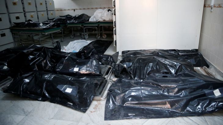Bags with bodies of migrants who died after an air strike hit a detention center for mainly African migrants in Tajoura are seen in Tripoli Central Hospital, Libya July 3, 2019