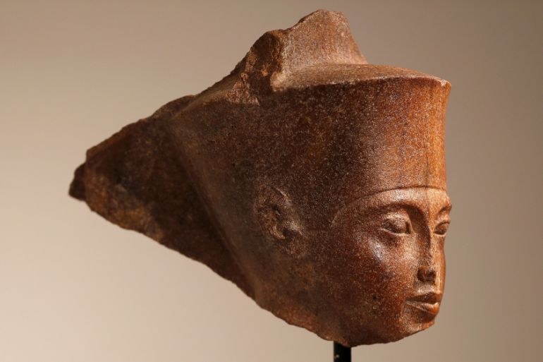 An Egyptian brown quartzite head of the God Amen is seen at Christie''s auction house prior to its'' sale in London, Britain, July 4, 2019. REUTERS/Peter Nicholls