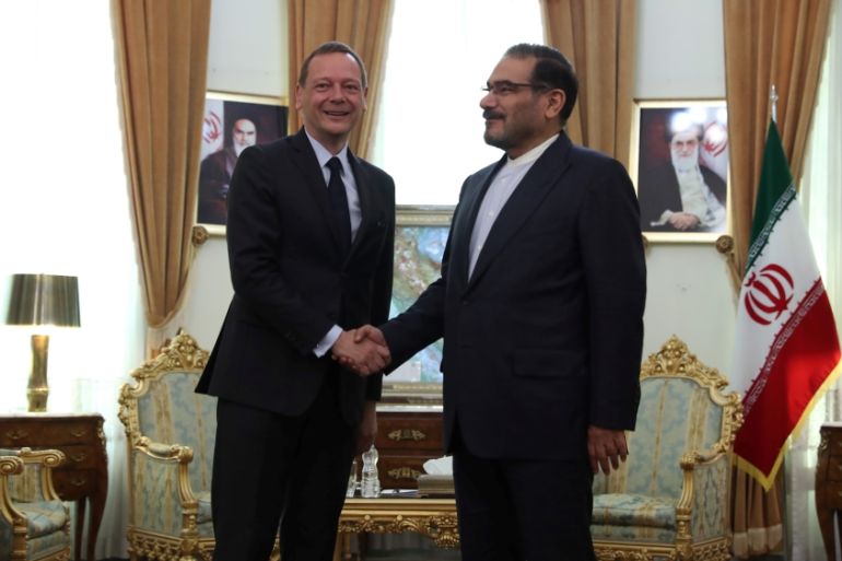 France''s top diplomat Emmanuel Bonne shakes hands with Ali Shamkhani, the Secretary of the Supreme National Security Council of Iran in Tehran