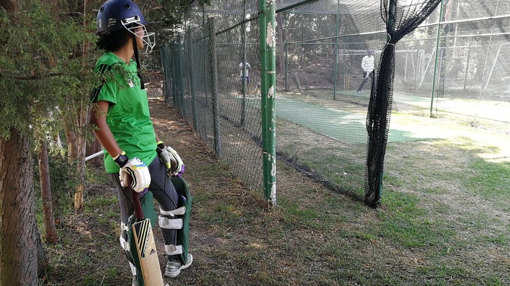 Julieta Marquina waiting to bat at a training session. Courtesy of Lauren Cocking.