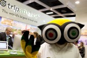 A mascot of TripAdvisor is seen at its stand at the International Tourism Trade Fair in Berlin on March 4, 2015 [File: Reuters/Axel Schmidt]