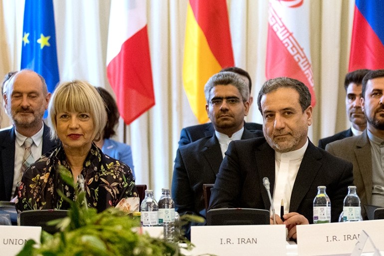Abbas Araghchi (Center R), political deputy at the Ministry of Foreign Affairs of Iran, and Helga Schmid (Center L), Secretary General of the European Union''s External Action Service (EEAS), take part