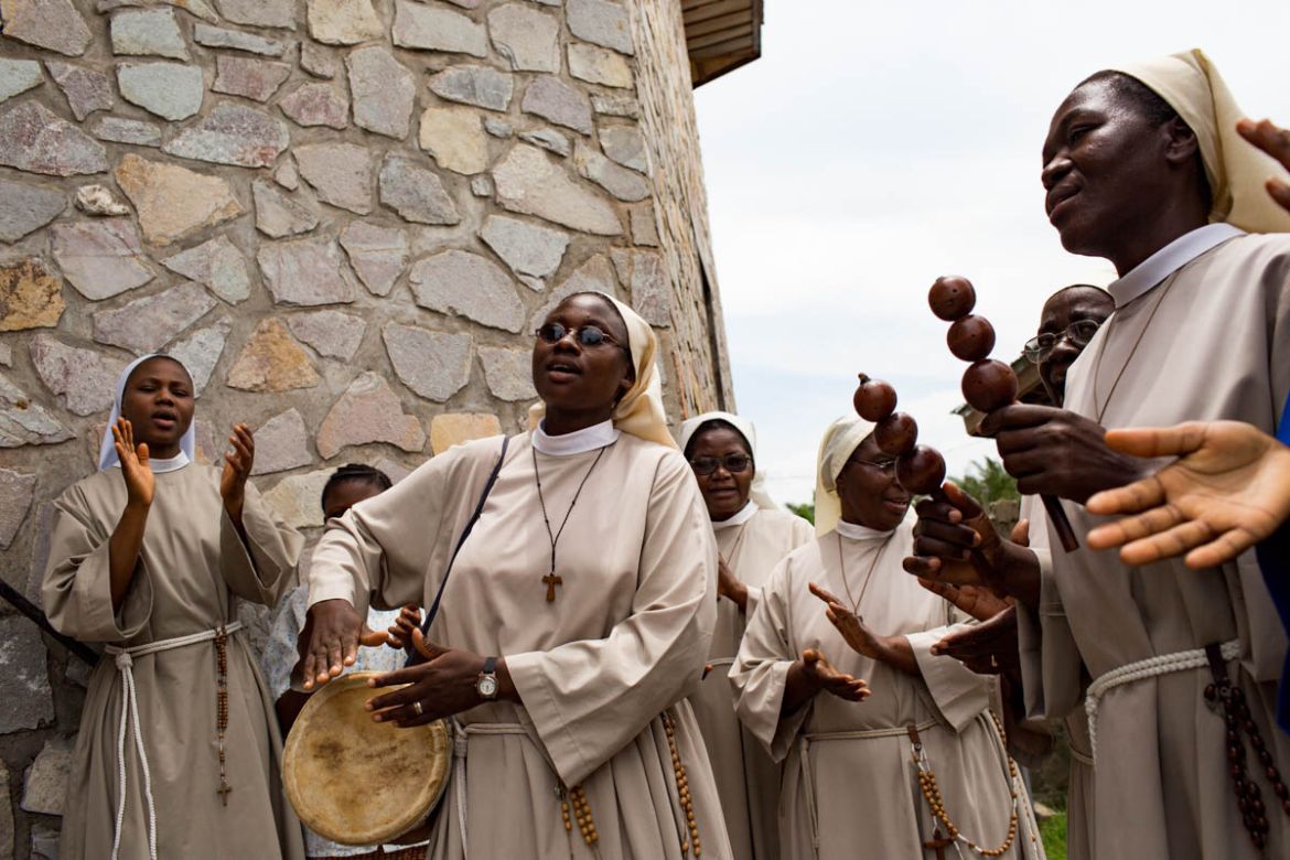 Sisters from the Poor Clares convent in Mbuji-Mayi come out of Mass with a musical performance. Several times attacked during the conflict, they pray every day for peace in their region.