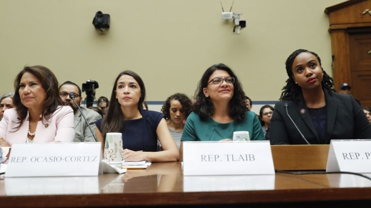 From l-r., Rep. Veronica Escobar, D-Texas, Rep. Alexandria Ocasio-Cortez, D-NY., Rep. Rashida Tlaib, D-Mich., and Rep. Ayanna Pressley, D-Mass., take their seats to testify before the House Oversight