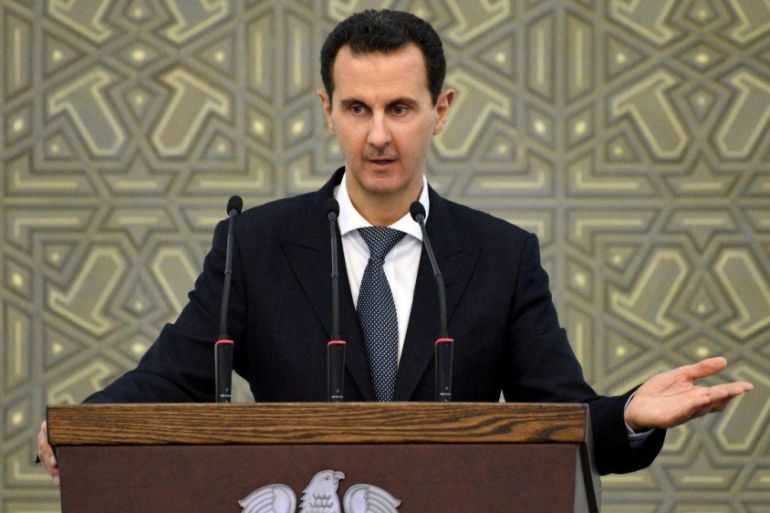 Syria''s President Bashar al-Assad speaks during a meeting with heads of local councils, in Damascus