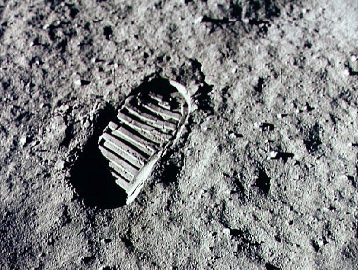 "Neil Armstrong descended the nine-rung ladder first, his left boot, size 9½, touching the lunar surface at 10:56pm EST. Buzz Aldrin followed him out 18 minutes later. [File: NASA/Newsmakers/Getty Im
