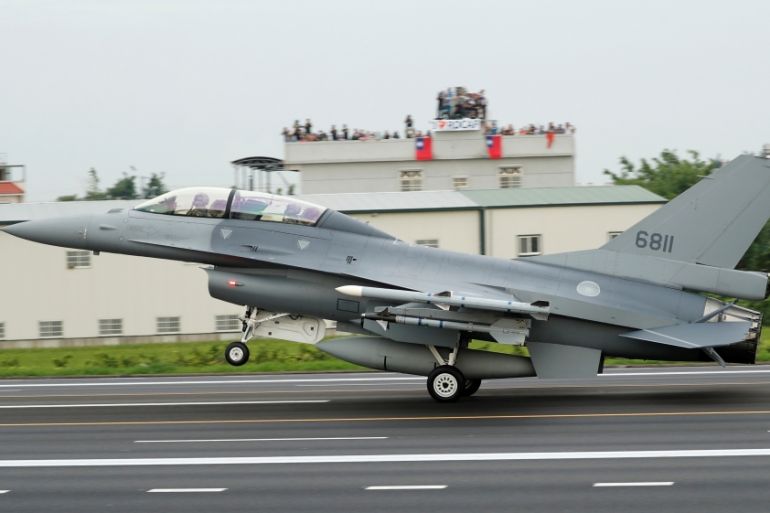 A ROCAF F-16V fighter jet lands on a highway used as an emergency runway during the Han Kuang military exercise simulating the China''s People''s Liberation Army (PLA) invading the island, in Changhua