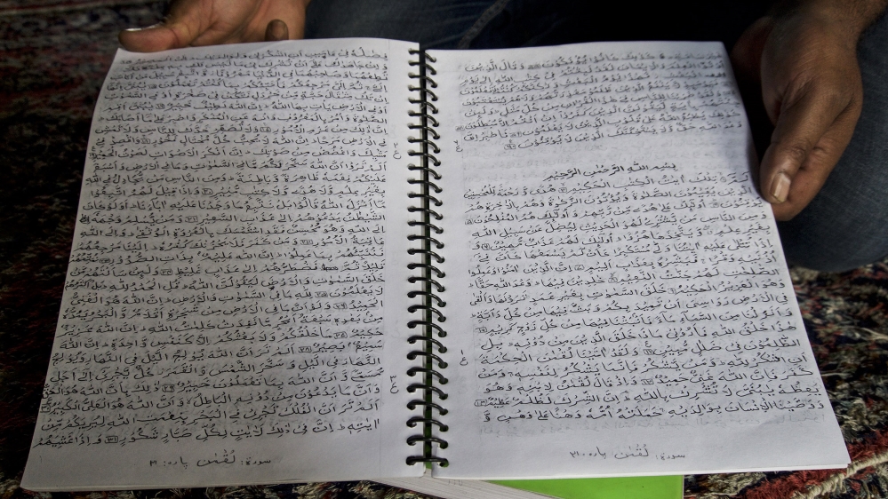 The picture of handwritten Quran by Ali Muhammad Bhat in jail.
