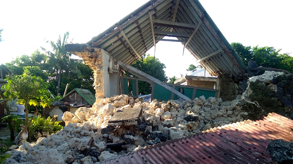 Damaged house lie in Itbayat town, Batanes islands, northern Philippines on Saturday, July 27, 2019. Two strong earthquakes hours apart struck a group of sparsely populated islands