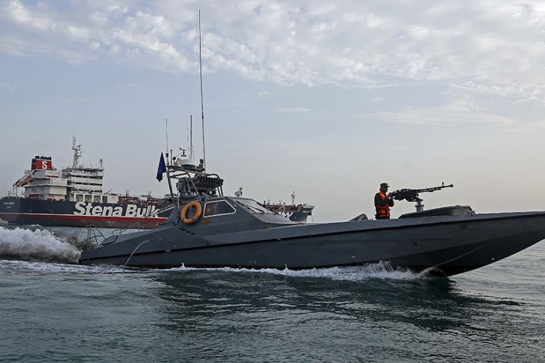 A picture taken on July 21, 2019, shows Iranian Revolutionary Guards patrolling around the British-flagged tanker Stena Impero as it''s anchored off the Iranian port city of Bandar Abbas. - Iran warned