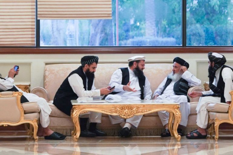 Taliban representatives at the inter-Afghan summit in Doha [Sorin Furcoi/Al Jazeera]