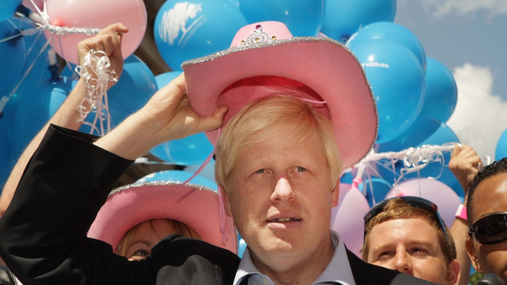 London Mayor Boris Johnson wears a pink stetson hat at the Gay Pride parade on July 5, 2008 in London, England. The parade consists of celebrities, floats, and performers celebrating the UK's largest 
