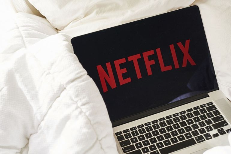 Netflix logo on laptop/Photographer: Gabby Jones/Bloomberg