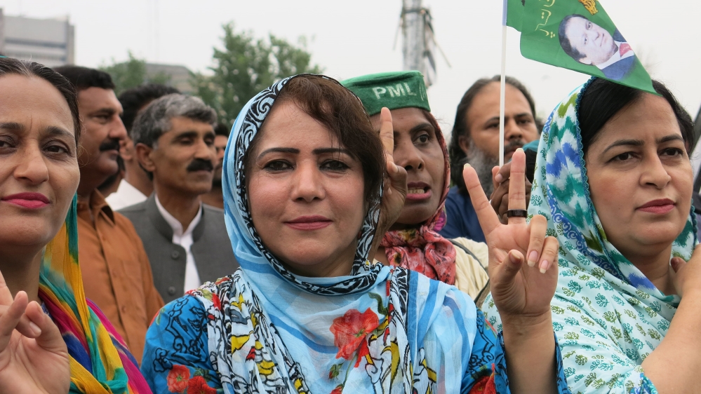 Farzana Kausar, 40, a PML-N party worker, accused Prime Minister Khan's government of targeting political opposition in an anti-corruption drive [Asad Hashim/Al Jazeera]