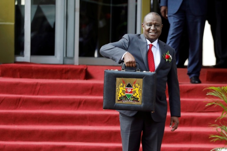 Kenya''s Cabinet Secretary of National Treasury Henry Rotich holds up a briefcase containing the Government Budget for the 2019/20 fiscal year in Nairobi