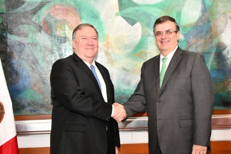 U.S Secretary of State Mike Pompeo shakes hands with Mexican Foreign Minister Marcelo Ebrard during a private meeting at the Foreign Ministry Building (SRE) in Mexico City