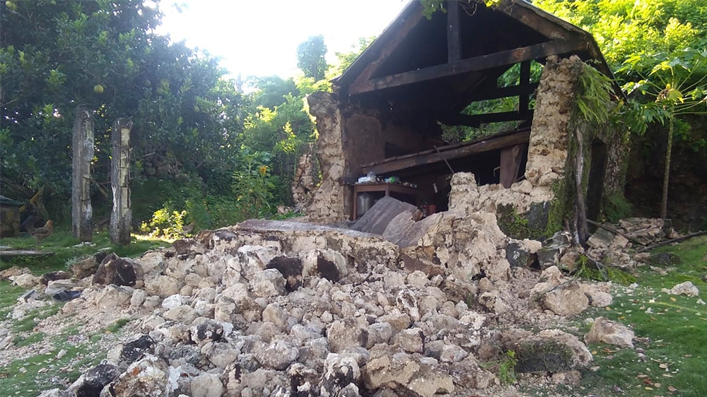 Damaged houses lie in Itbayat town, Batanes islands, northern Philippines following the earthquakes, Saturday, July 27, 2019. Two strong earthquakes hours apart struck a group of sparsely populated