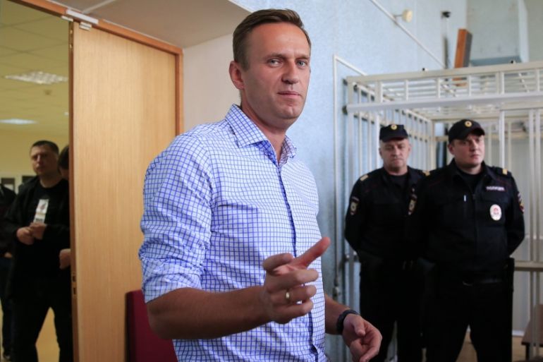 Russian opposition leader Alexei Navalny, who is charged with participation in an unauthorised protest rally, addresses journalists after a court hearing in Moscow, Russia July 1, 2019