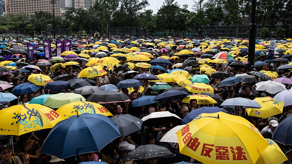 Protesters gather at Victoria Park to participate in an anti-government march in Hong Kong on July 21, 2019. - Hong Kong is bracing for another huge anti-government march on July 21 afternoon with see