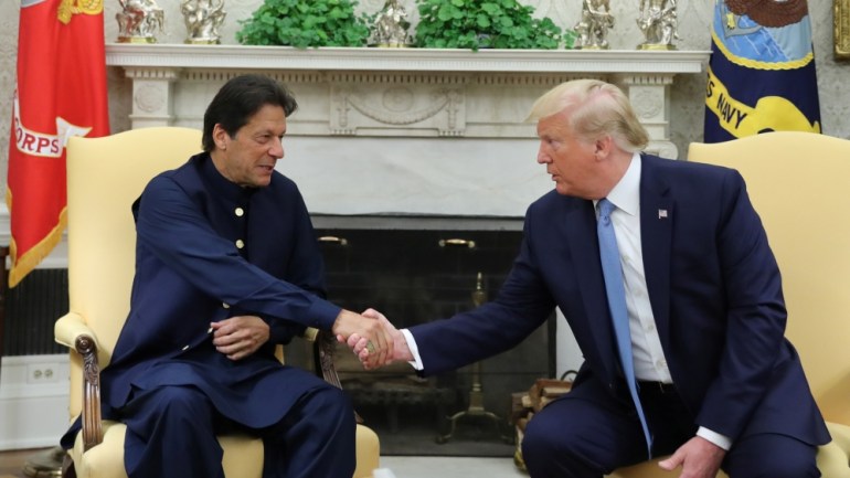 Pakistan’s Prime Minister Imran Khan shakes hands with U.S. President Donald Trump at the start of their meeting in the Oval Office of the White House in Washington, U.S., July 22, 2019. REUTERS/Jonat