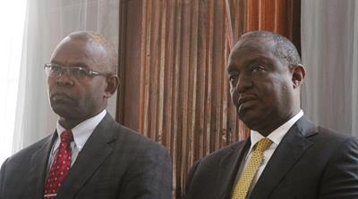 Kenya's Finance Minister Henry Rotich and Principal Secretary Kamau Thugge