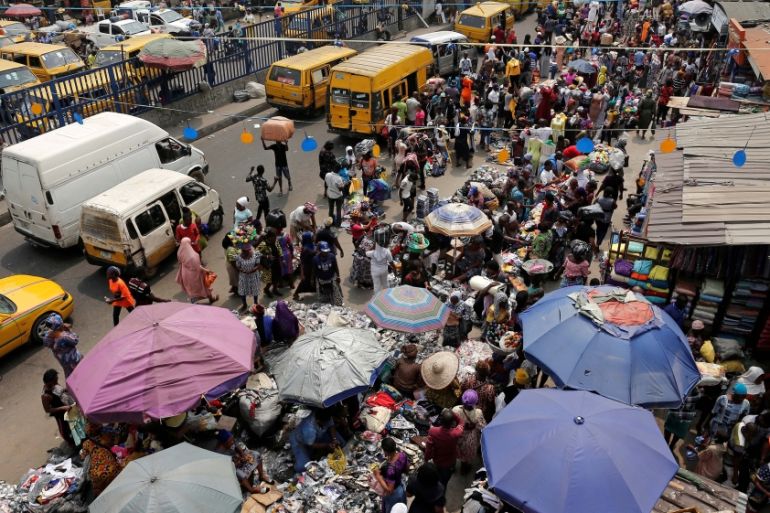 People shop at Idumota Market in Lagos Nigeria