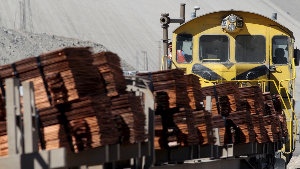 A train loaded with copper cathodes travels along a rail line inside the Chuquicamata copper mine, which is owned by Chile's state-run copper producer Codelco