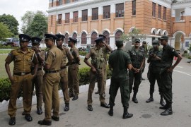 Sri Lankan police officers arrive at a public school to conduct a search in Colombo, Sri Lanka, Sunday, May 5, 2019.