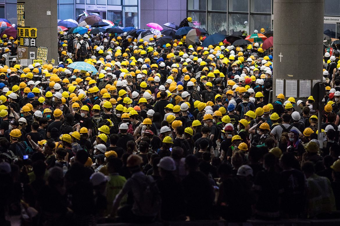 Protesters gather outside the government headquarters in Hong Kong on July 1, 2019, on the 22nd anniversary of the city''s handover from Britain to China. Hundreds of protesters stormed Hong Kong''s par