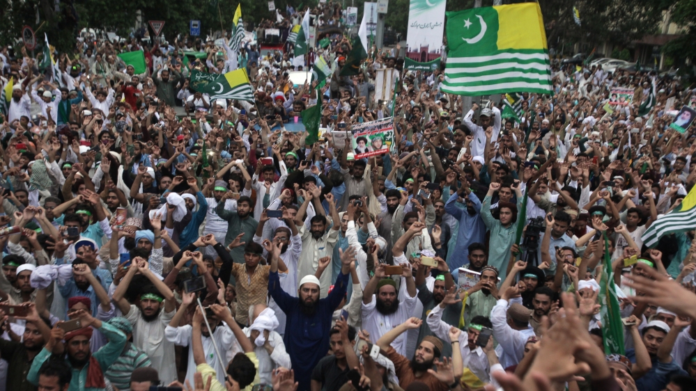 People rally to express solidarity with the people of Kashmir, in Lahore