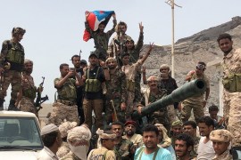 Yemeni supporters of the southern separatist movement pose for a picture in Khor Maksar, in the Yemeni southern port city of Aden on August 10, 2019. - Southern separatists in Yemen said on August 10