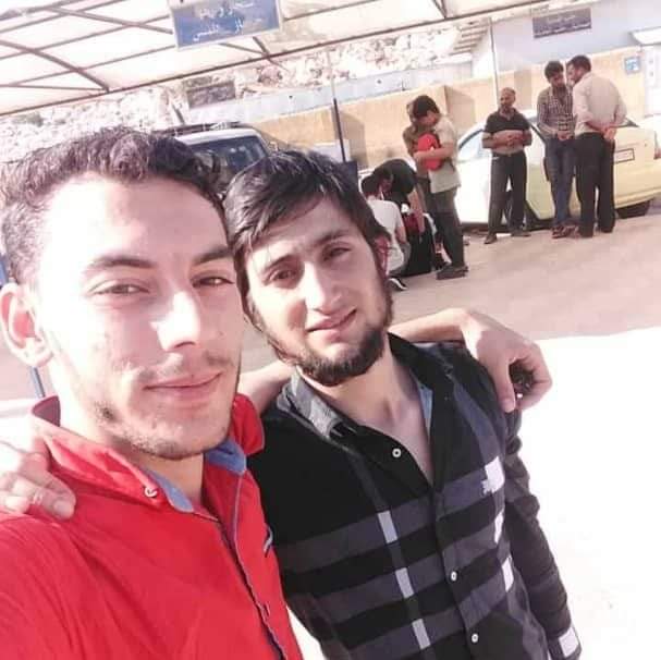 Hisham Bab Al Hawa: The photo sent to Abu Hisham after his Mustafa (R) crossed the border back into Syria and was met by his friend. Provided by Abu Hisham.