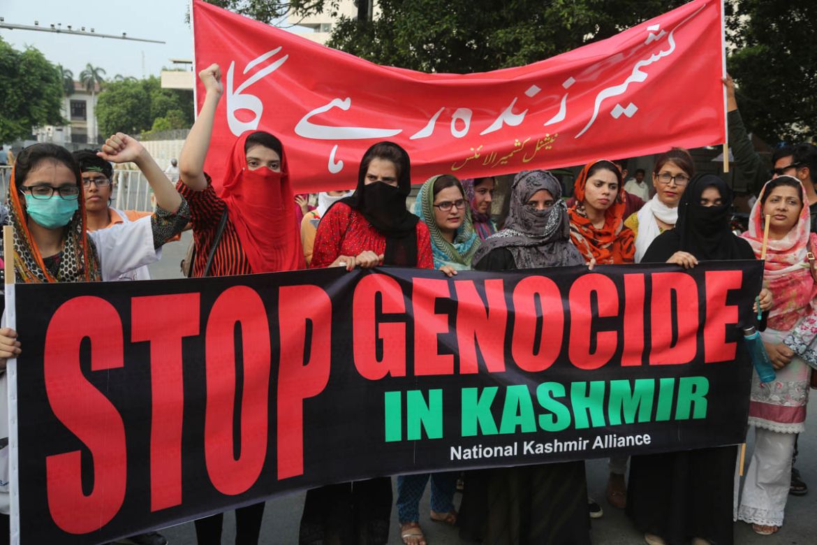 Pakistanis protest against India and express support and solidarity with Indian Kashmiri people in their peaceful struggle for their right to self-determination, in Lahore, Pakistan, Monday, Aug. 5, 2