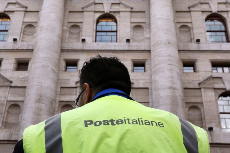 A Poste Italiane employee protest in front of Milan''s stock exchange downtown Milan