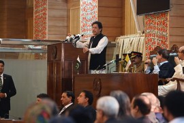 Pakistan''s Prime Minister Imran Khan (C) addresses the legislative assembly in Muzaffarabad, the capital of Pakistan-controlled Kashmir on August 14, 2019, to mark the country''s Independence Day. - Hi
