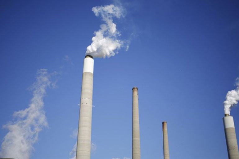 Emissions rise from a coal-fired power plant in Winfield, West Virginia