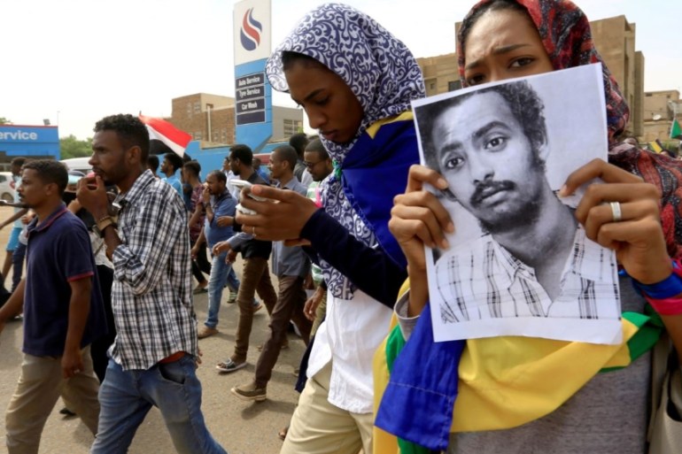 People demonstrate against the killing of protesting children, who were shot dead when security forces broke up a student protest in Khartoum