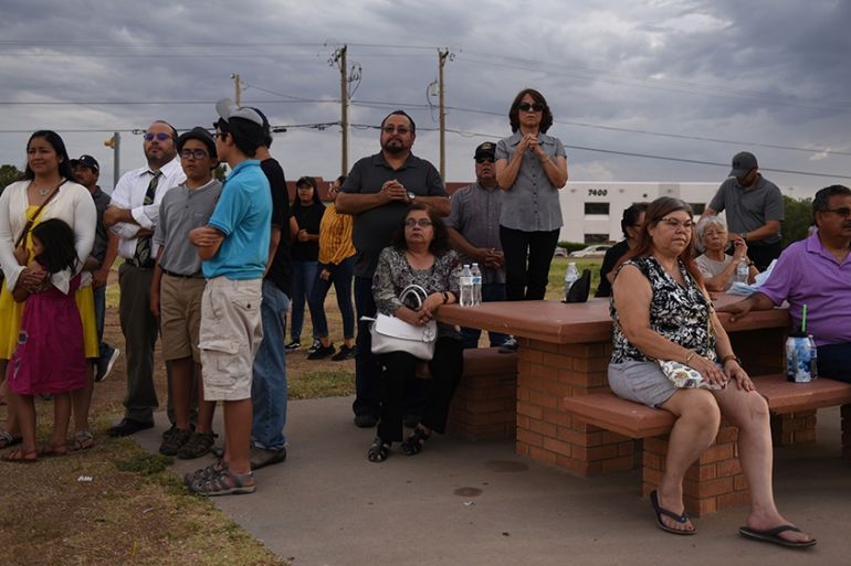 People gather for a vigil a day after a mass shooting at a Walmart store in El Paso, Texas, U.S. August 4, 2019. REUTERS/Callaghan O''Hare