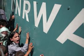 In this Sunday, Aug. 16, 2015 file photo, a Palestinian school girl chants slogans during a demonstration against a U.N. Relief and Works Agency (UNRWA) funding gap that could keep about 500,000 Pales