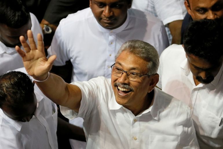 Sri Lanka''s former defense secretary Gotabaya Rajapaksa waves after he was nominated as a presidential candidate during the Sri Lanka People''s Front party convention in Colombo