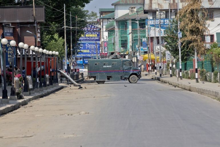 An armored vehicle of Indian police blocks a road during curfew in central Srinagar, Indian controlled Kashmir, Monday, Aug. 5, 2019. India''s government revoked disputed Kashmir''s special status with