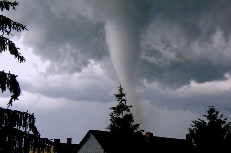 A tornado forms in the sky above Aken some 150 kilometres south of Berlin in this picture taken June 23, 2004. Around 100 buildings were partially destroyed after a tornado raged through the east Germ