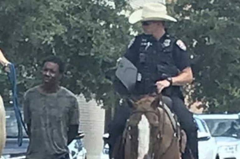 Outrage in US as photo shows police leading black man by a rope