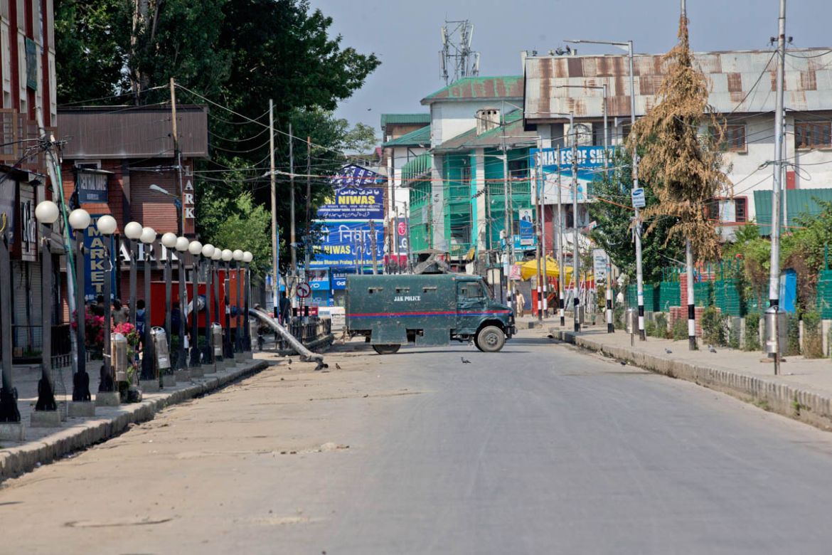 An armored vehicle of Indian police blocks a road during curfew in central Srinagar, Indian controlled Kashmir, Monday, Aug. 5, 2019. India''s government revoked disputed Kashmir''s special status with