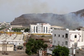 Smoke rises during clashes in Aden